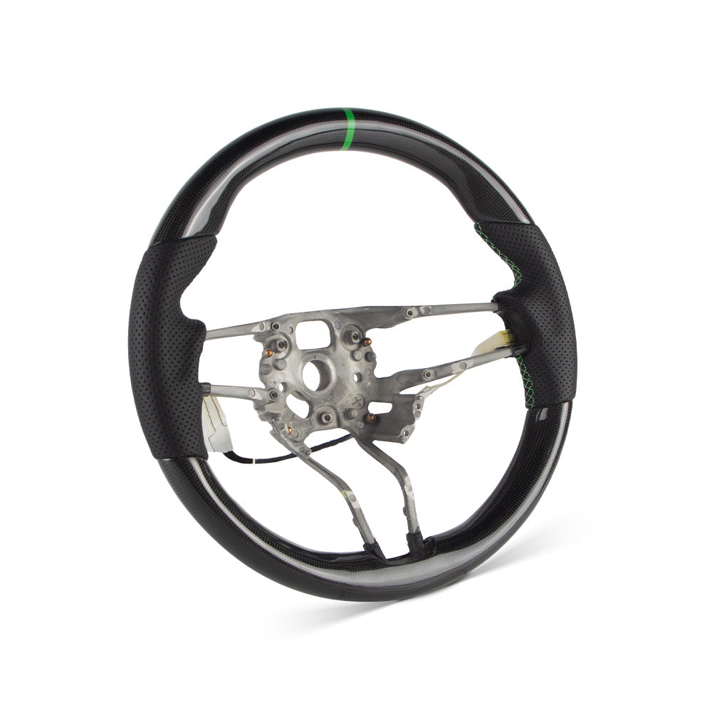 <img src="steering-wheel-side.jpg" alt="Porsche 991 carbon fiber steering wheel">