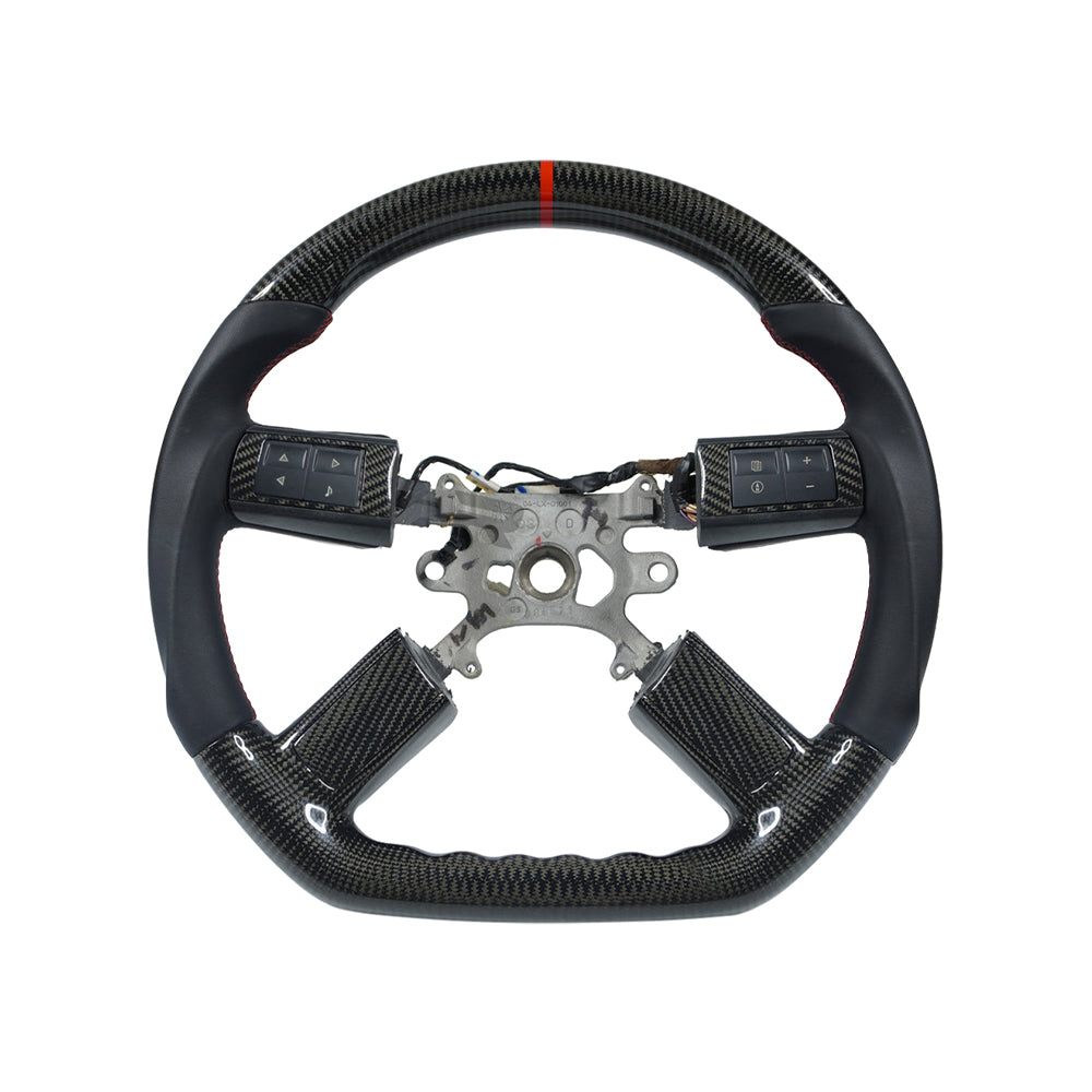 <img src="steering-wheel-front.jpg" alt="Front view of custom carbon fiber steering wheel for 2005-2010 Chrysler 300">